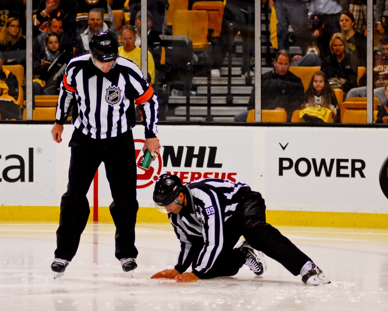 Can a Linesman Call a Penalty in Hockey