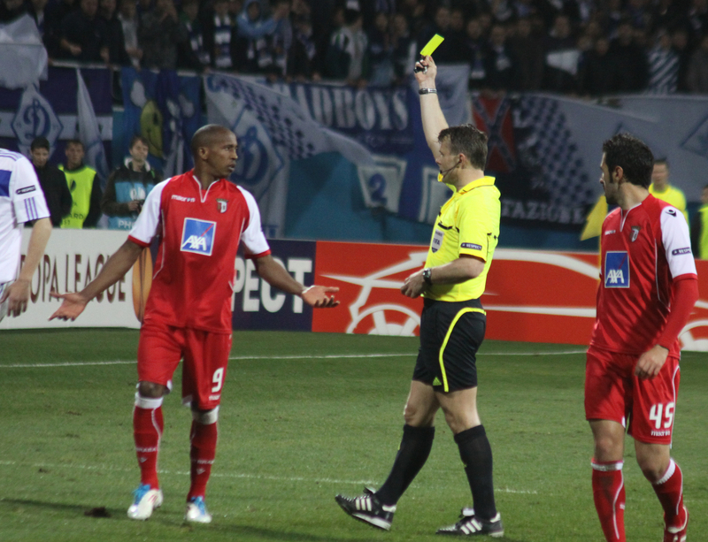 What Does the Referee Do to Signal a Yellow Card