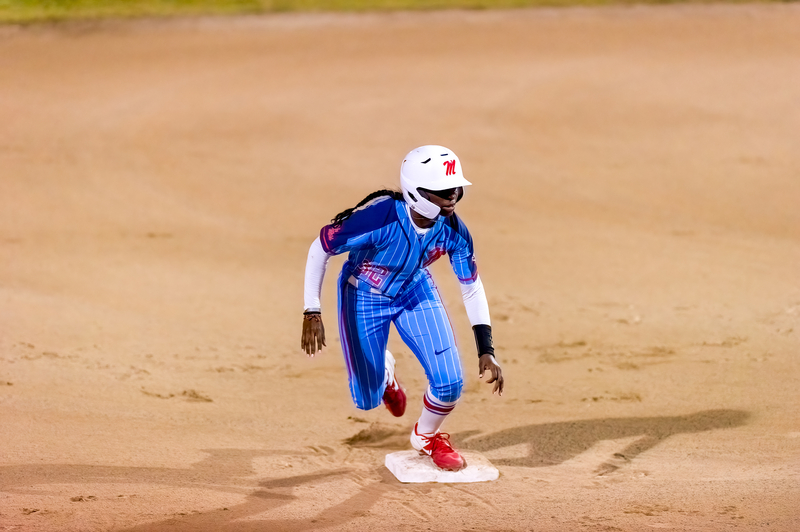 How Does Stealing Bases Work in Softball vs. Baseball